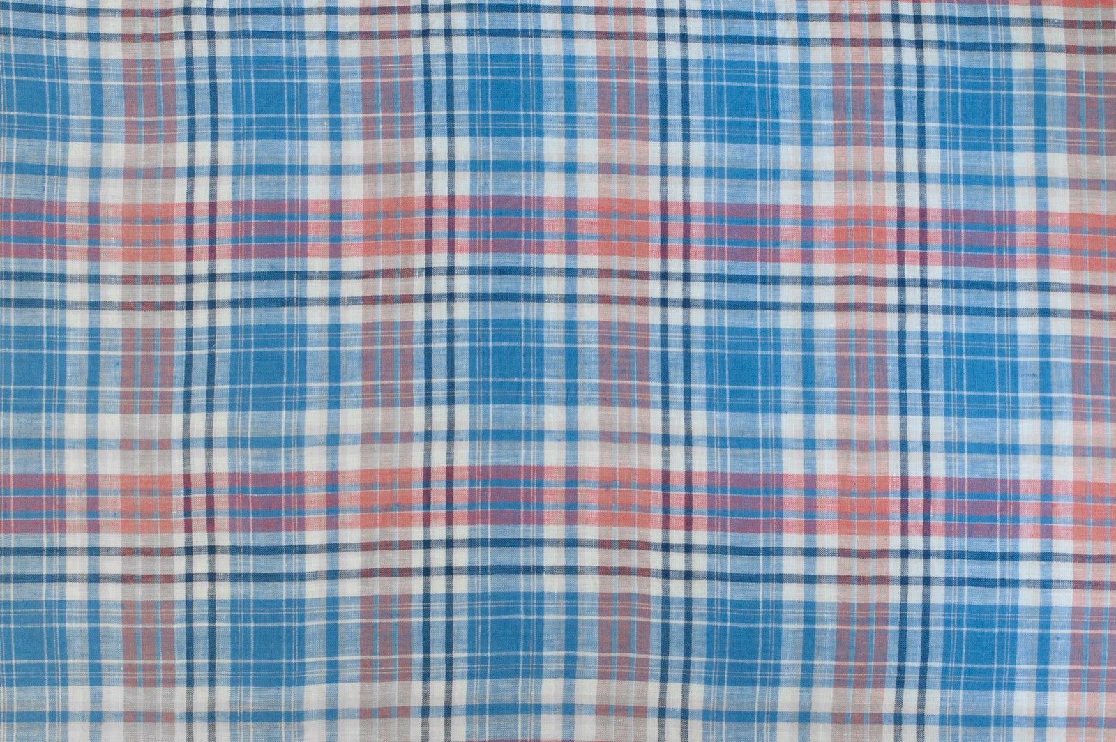 Organic yarn-dyed linen fabric featuring vintage blue, rose, and ivory plaid check pattern with soft textured weave.