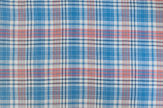 Organic yarn-dyed linen fabric featuring vintage blue, rose, and ivory plaid check pattern with soft textured weave.