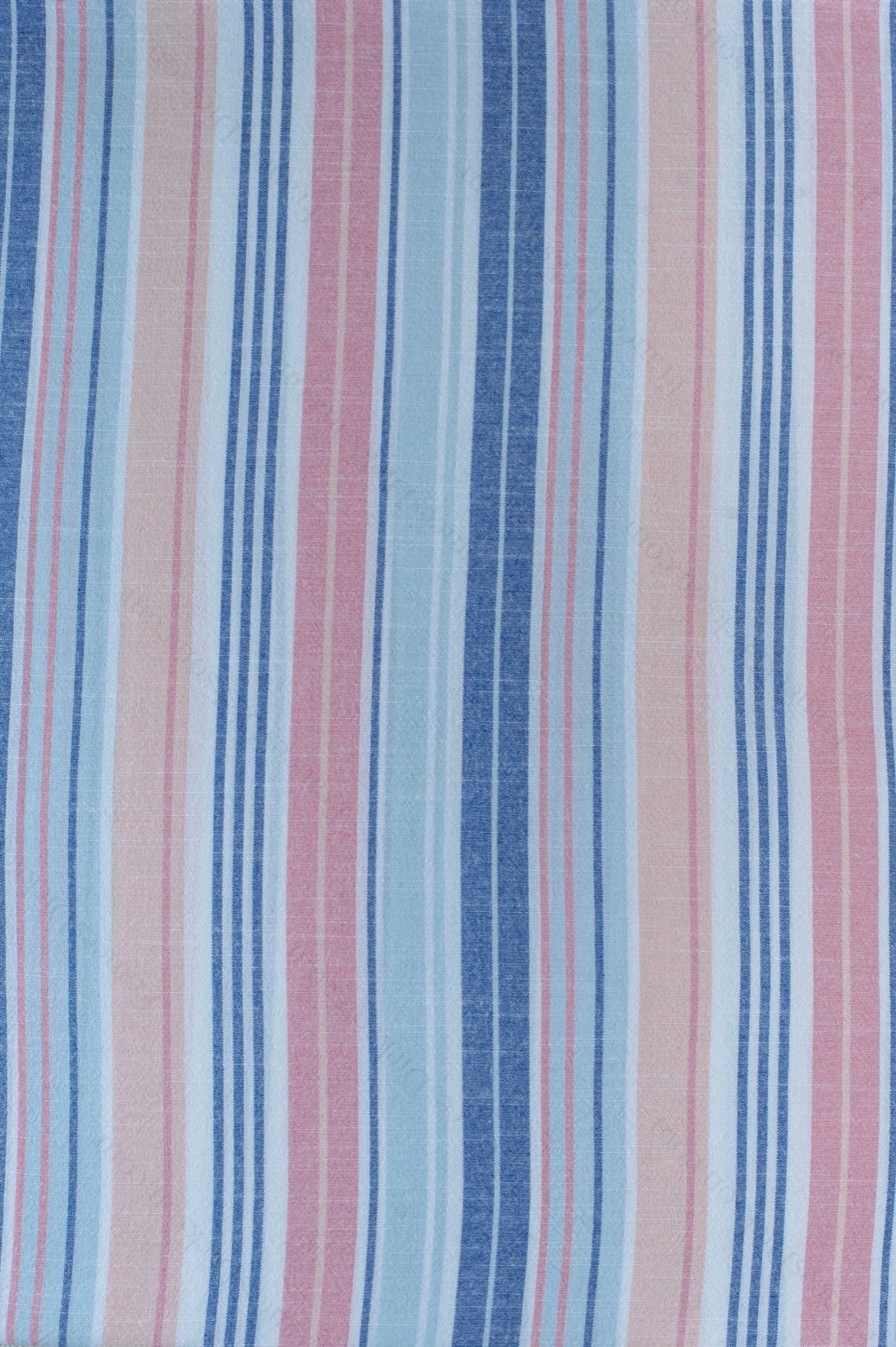Organic cotton shirting fabric with blue, pink, and white yarn-dyed stripes, laid flat to show the multi-color vertical stripe pattern.